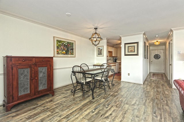 157 Kings Hwy Unit I, Milford, CT 06460 - dining area featuring ornamental molding, dark wood finished floors, and a notable chandelier
