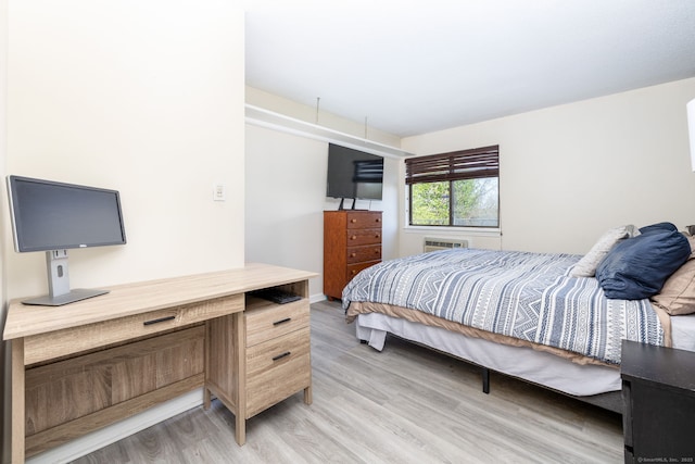 bedroom featuring light wood-type flooring