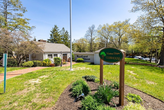 community sign with a lawn