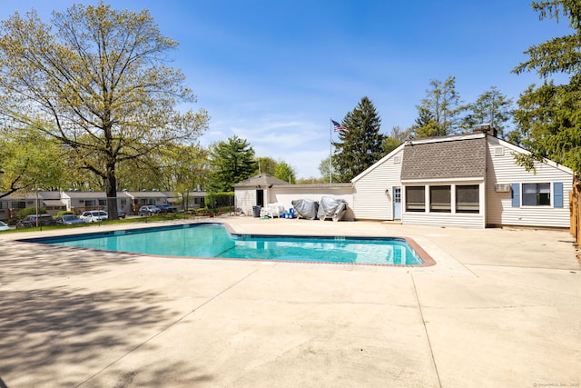 view of pool featuring a patio and a fenced in pool