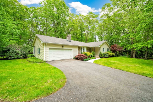 26 Converse Rd, Bolton, CT 06043 - ranch-style house with driveway, a chimney, a garage, and a front yard