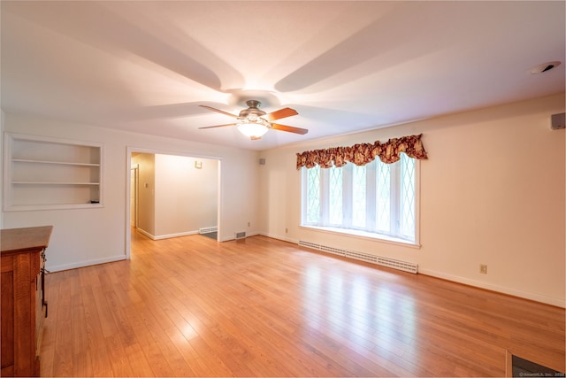 26 Converse Rd, Bolton, CT 06043 - empty room with a baseboard radiator, a ceiling fan, built in features, baseboards, and light wood-style floors