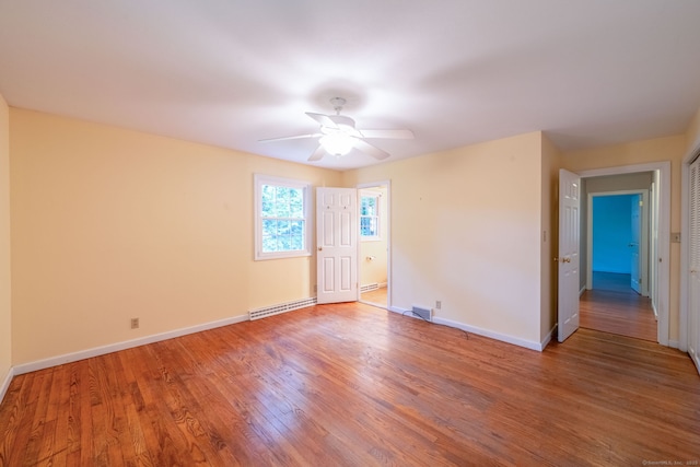26 Converse Rd, Bolton, CT 06043 - spare room with ceiling fan, wood finished floors, and baseboards