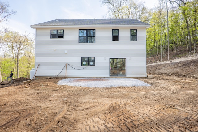 back of property featuring a patio