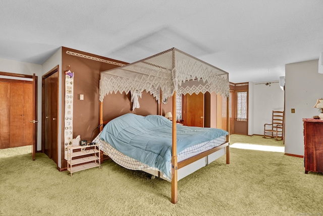 bedroom with baseboards and carpet flooring
