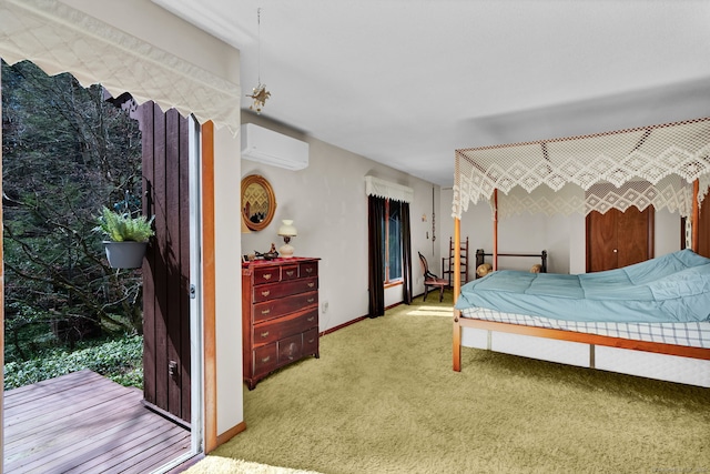 carpeted bedroom with baseboards and a wall mounted air conditioner