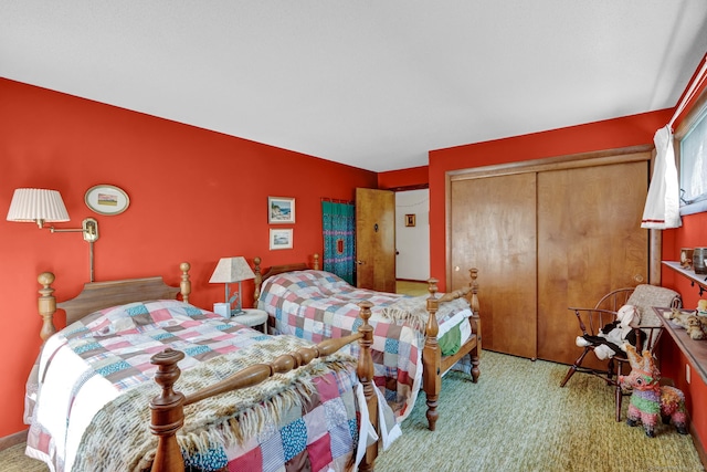 carpeted bedroom featuring a closet