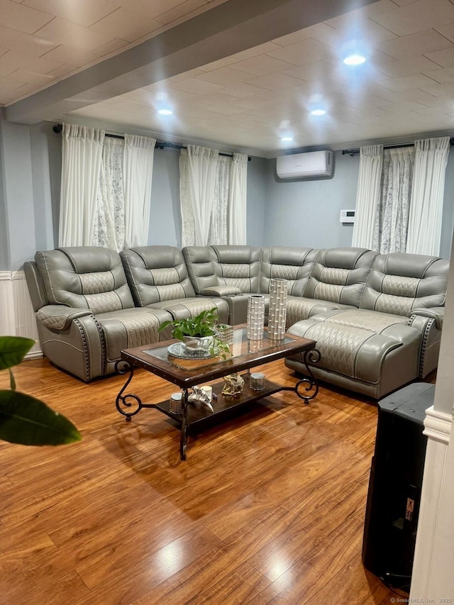 310 Sentinel Hill Rd, Derby, CT 06418 - living room featuring recessed lighting, a wall mounted air conditioner, wood finished floors, and a wealth of natural light