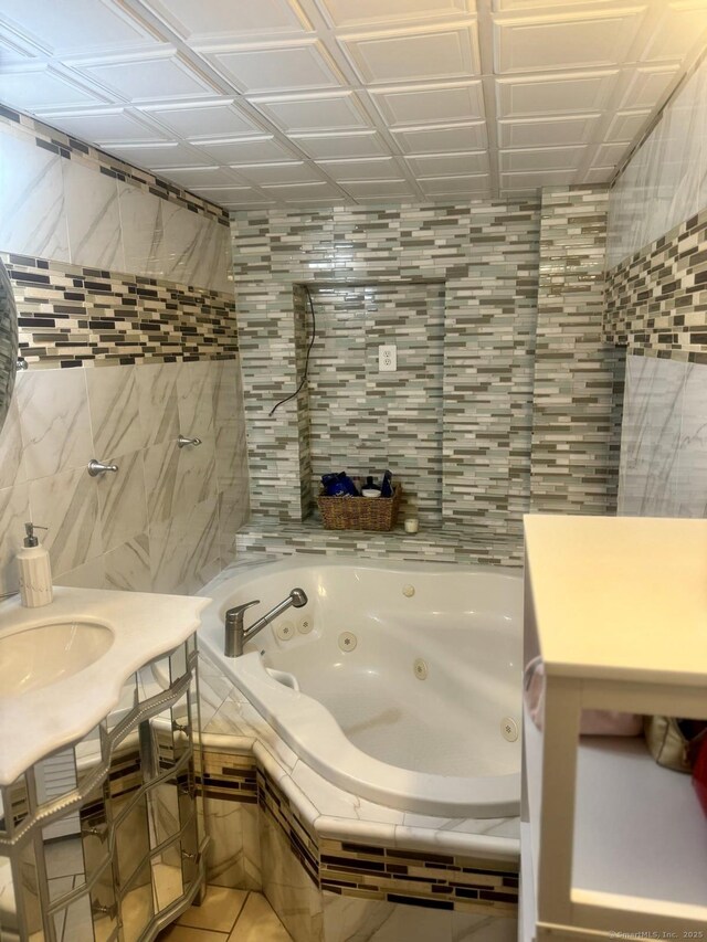 310 Sentinel Hill Rd, Derby, CT 06418 - bathroom featuring tile patterned flooring, vanity, and tile walls