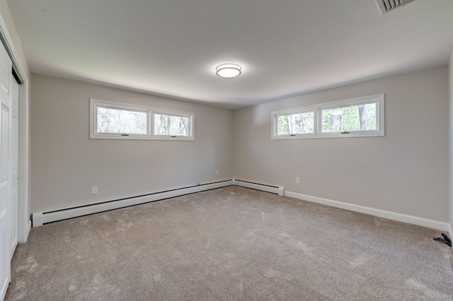 1037 Bartholomew Rd, Middletown, CT 06457 - unfurnished bedroom with a baseboard heating unit, carpet floors, a closet, and baseboards