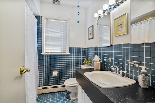 bathroom with visible vents, tile walls, tile patterned flooring, a baseboard heating unit, and toilet