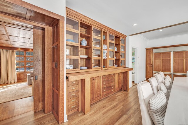 interior space featuring ornamental molding, recessed lighting, and light wood-style flooring