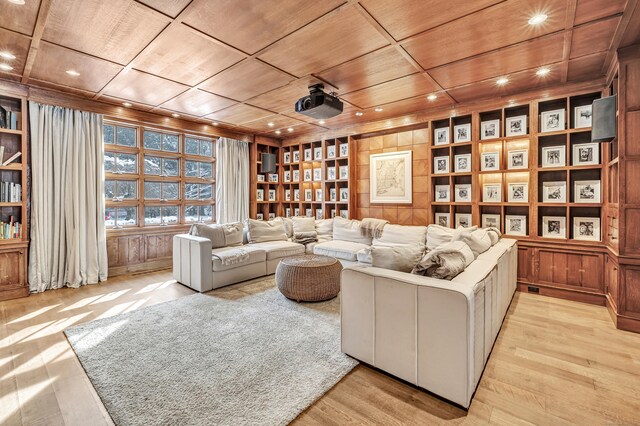 living room featuring recessed lighting, wood walls, and wooden ceiling