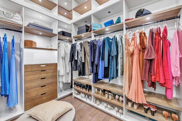 spacious closet featuring wood finished floors