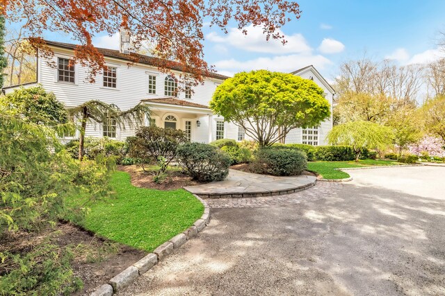 view of front of property featuring a chimney