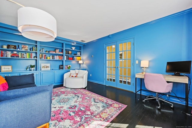 office space featuring french doors, built in features, wood finished floors, and visible vents