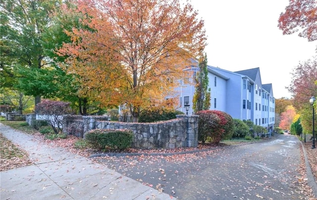 view of side of property featuring stucco siding