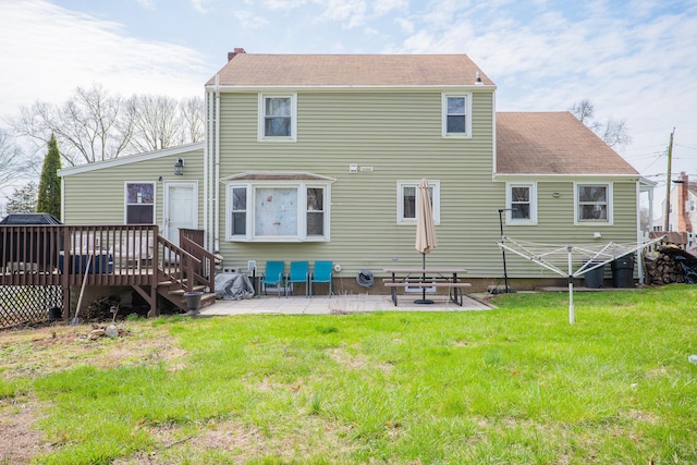 50 Fox Hill Rd, Stratford, CT 06614 - rear view of house with roof with shingles, a yard, a patio area, and a deck