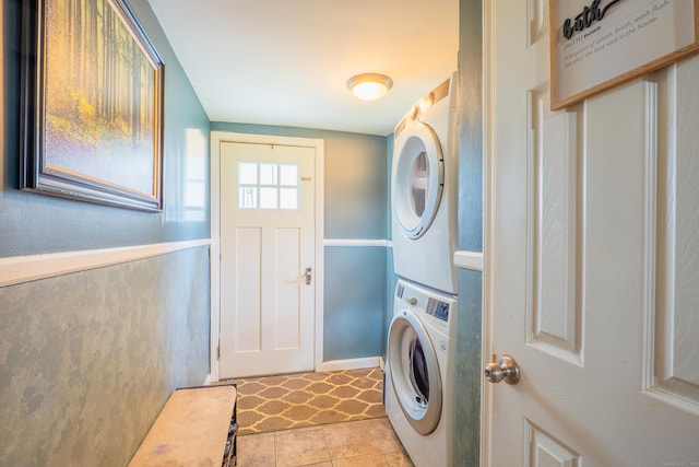 50 Fox Hill Rd, Stratford, CT 06614 - laundry room featuring light tile patterned flooring and stacked washer / dryer