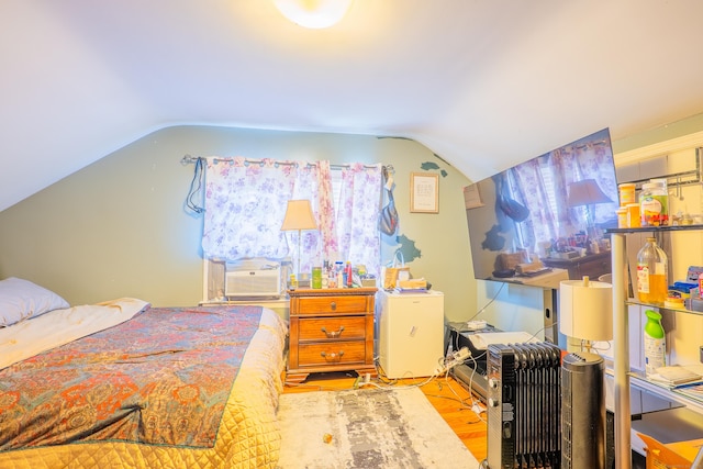 50 Fox Hill Rd, Stratford, CT 06614 - bedroom featuring cooling unit, wood finished floors, and lofted ceiling