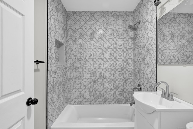 bathroom featuring vanity and bathtub / shower combination