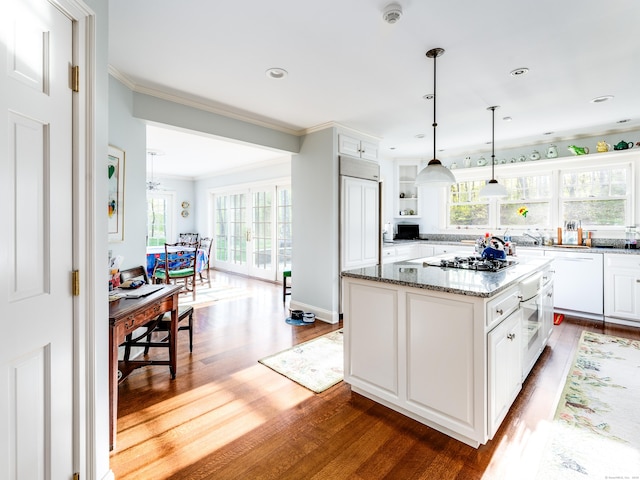 5 Clarks Ln, Old Lyme, CT 06371 - kitchen with dark wood finished floors, white cabinets, healthy amount of natural light, ornamental molding, and recessed lighting