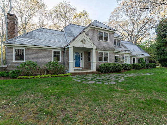 5 Clarks Ln, Old Lyme, CT 06371 - shingle-style home featuring a front yard and a chimney