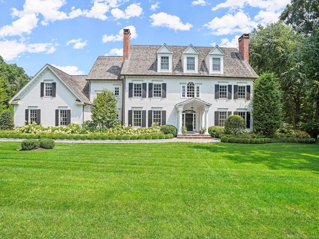 2 Grouse Path, Westport, CT 06880 - colonial inspired home featuring a chimney and a front lawn