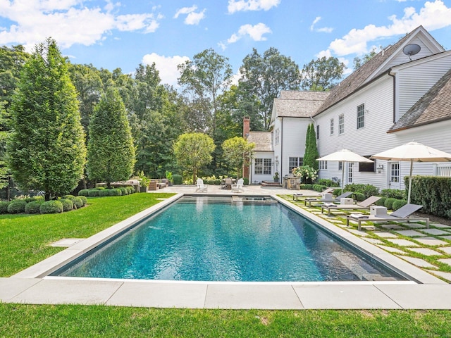 2 Grouse Path, Westport, CT 06880 - swimming pool featuring a patio and a yard