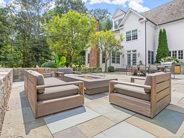 2 Grouse Path, Westport, CT 06880 - view of patio featuring an outdoor living space with a fire pit and outdoor dining space