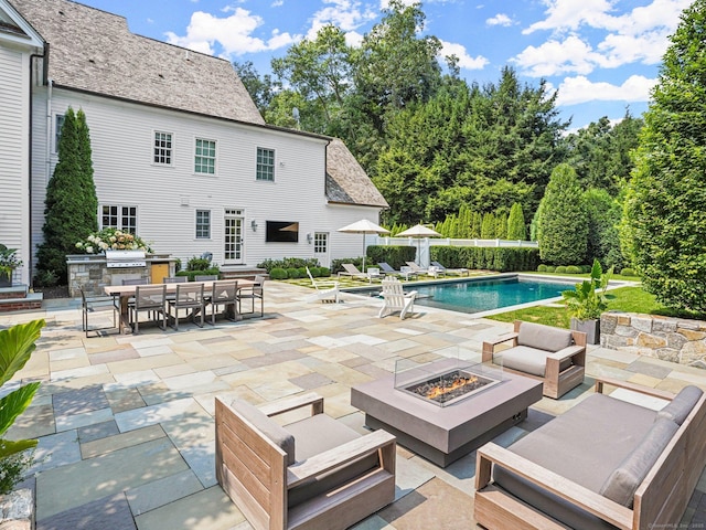 2 Grouse Path, Westport, CT 06880 - view of swimming pool with a patio, outdoor dining space, an outdoor living space with a fire pit, an outdoor kitchen, and area for grilling
