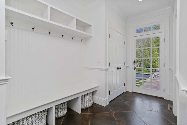 2 Grouse Path, Westport, CT 06880 - mudroom with crown molding, dark tile patterned flooring, a wainscoted wall, and a decorative wall