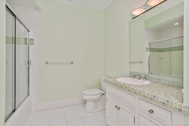 2 Grouse Path, Westport, CT 06880 - full bath featuring tile patterned floors, toilet, vanity, enclosed tub / shower combo, and baseboards