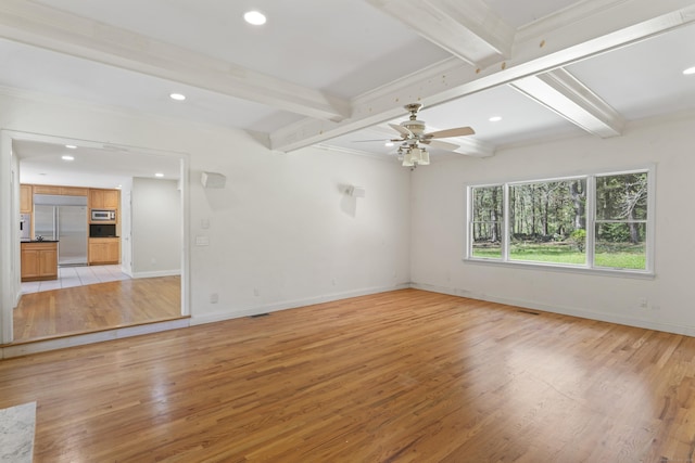 empty room with a ceiling fan, beam ceiling, baseboards, light wood-style floors, and recessed lighting