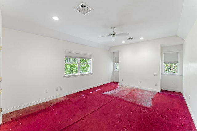 unfurnished room with recessed lighting, baseboards, visible vents, and plenty of natural light