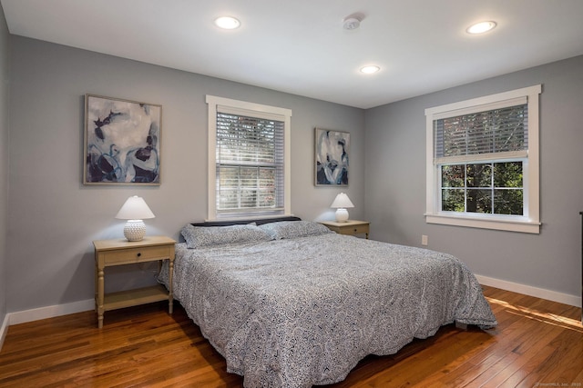 bedroom featuring recessed lighting, baseboards, and hardwood / wood-style floors