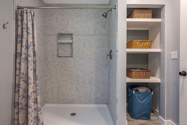 full bath with a shower with shower curtain