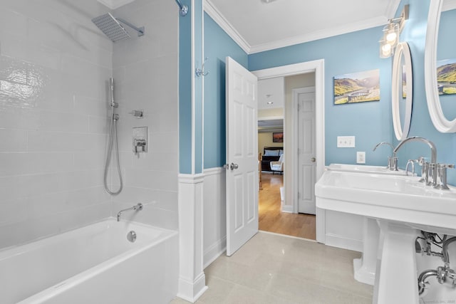 bathroom with bathing tub / shower combination and crown molding