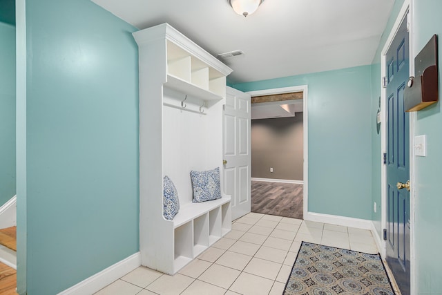 127 Hanover Rd, Newtown, CT 06470 - mudroom featuring light tile patterned flooring and baseboards