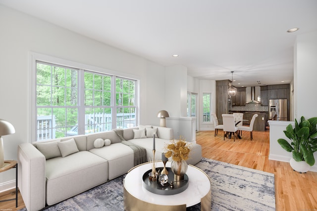 127 Hanover Rd, Newtown, CT 06470 - living area featuring recessed lighting, light wood finished floors, and a chandelier
