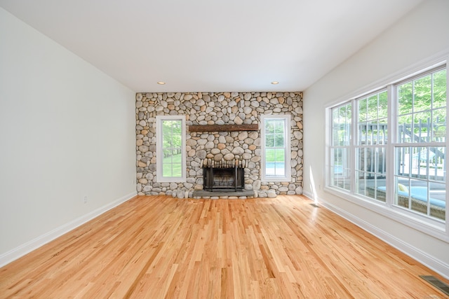 127 Hanover Rd, Newtown, CT 06470 - unfurnished living room featuring baseboards, wood finished floors, a fireplace, and recessed lighting