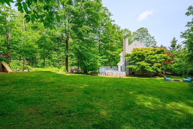 127 Hanover Rd, Newtown, CT 06470 - view of grassy yard with a playground and an outdoor pool