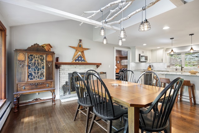 161 Center Hill Rd, Barkhamsted, CT 06063 - dining room featuring baseboard heating, dark wood-style flooring, recessed lighting, and a fireplace
