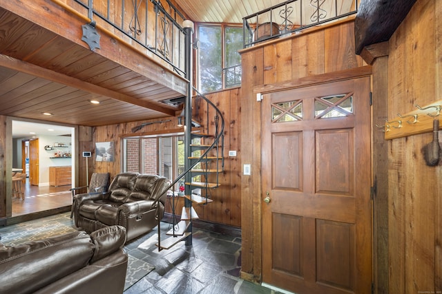161 Center Hill Rd, Barkhamsted, CT 06063 - foyer entrance with wood walls, stairs, stone tile floors, and wood ceiling