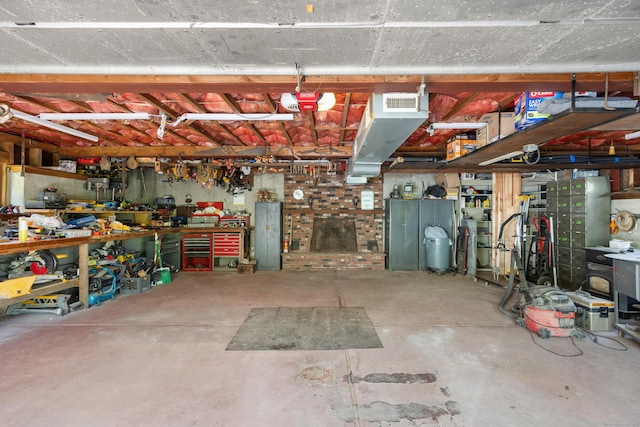 161 Center Hill Rd, Barkhamsted, CT 06063 - garage with a workshop area and a garage door opener
