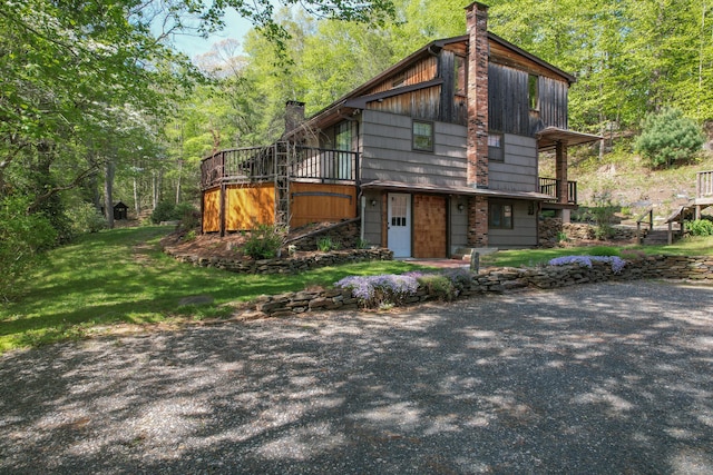 161 Center Hill Rd, Barkhamsted, CT 06063 - view of front of house featuring a chimney, a wooden deck, and a front yard