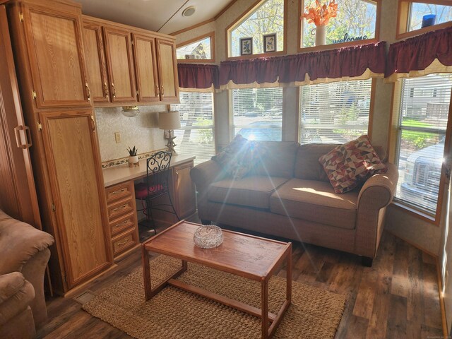 42 Pierce Rd, Preston, CT 06365 - living area with plenty of natural light, dark wood-type flooring, lofted ceiling, and an office area