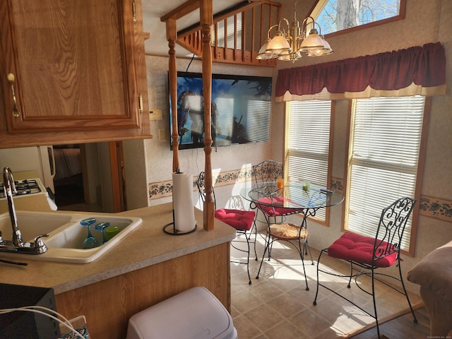 42 Pierce Rd, Preston, CT 06365 - dining area with plenty of natural light and a chandelier