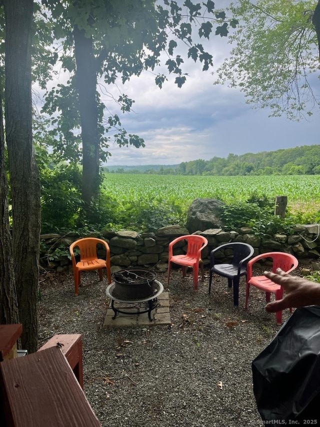 42 Pierce Rd, Preston, CT 06365 - view of yard with agricultural plots, an outdoor fire pit, and a view of rural / pastoral area