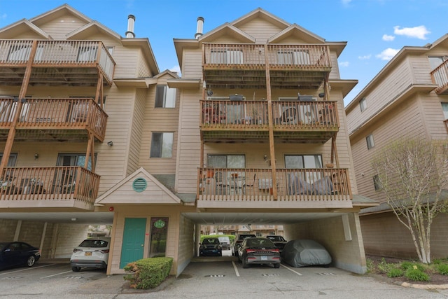 97 Richards Ave Apt F5, Norwalk, CT 06854 - view of building exterior with covered parking